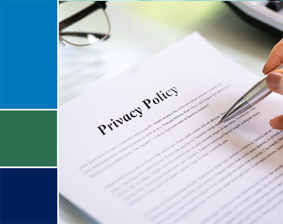 Image of paper on desk that reads "Privacy Policy"